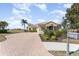 Beautiful home with a brick driveway at 108 Savona Ct, North Venice, FL 34275