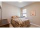 Cozy bedroom with a double bed and wall decor at 11136 Shearwater Ct, Sarasota, FL 34238