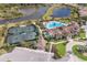 Resort-style pool, clubhouse, and tennis courts at 11136 Shearwater Ct, Sarasota, FL 34238