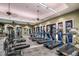 Modern fitness center featuring treadmills and strength training equipment at 11136 Shearwater Ct, Sarasota, FL 34238