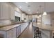 Modern kitchen with granite countertops and stainless steel appliances at 11136 Shearwater Ct, Sarasota, FL 34238