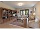 Bright living room with built-in shelving and comfortable seating at 11136 Shearwater Ct, Sarasota, FL 34238