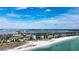 Property's location shown with beach and city views at 117 S Polk Dr, Sarasota, FL 34236