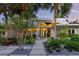 Mid-century modern home with landscaped walkway at 117 S Polk Dr, Sarasota, FL 34236