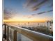 Spacious balcony with breathtaking sunset views over the ocean and beach at 1281 Gulf Of Mexico Dr # 404, Longboat Key, FL 34228