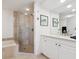 Bathroom with walk-in shower and modern vanity at 1281 Gulf Of Mexico Dr # 404, Longboat Key, FL 34228