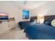 Guest bedroom with two twin beds and ocean view at 1281 Gulf Of Mexico Dr # 404, Longboat Key, FL 34228