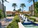 Elegant cascading fountain in front of community building at 1281 Gulf Of Mexico Dr # 404, Longboat Key, FL 34228