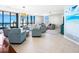 Bright and airy living room with ocean views and comfortable seating at 1281 Gulf Of Mexico Dr # 404, Longboat Key, FL 34228