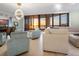 Open living area showcasing a large sectional sofa and breathtaking sunset views at 1281 Gulf Of Mexico Dr # 404, Longboat Key, FL 34228