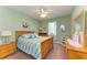 Bedroom with wood furniture and ceiling fan at 12904 49Th E Ln, Parrish, FL 34219