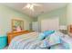 Bedroom with wood furniture and ceiling fan at 12904 49Th E Ln, Parrish, FL 34219