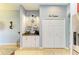 Kitchen features coffee bar and pantry with white shaker cabinets at 12904 49Th E Ln, Parrish, FL 34219