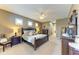 Large main bedroom with a king-size bed and plenty of closet space at 12904 49Th E Ln, Parrish, FL 34219