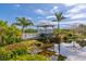 Relaxing gazebo overlooking a pond with lush landscaping at 1341 Perico Point Cir # 116, Bradenton, FL 34209