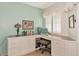 Bright home office with built-in desk and cabinets at 1341 Perico Point Cir # 116, Bradenton, FL 34209