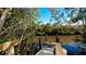 Serene wooden dock extending into calm waters at 1341 Perico Point Cir # 116, Bradenton, FL 34209