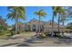 Beautiful home with palm trees and a large driveway at 13616 Legends Walk Ter, Lakewood Ranch, FL 34202