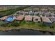 Aerial view of homes and a lake at 13925 Miranese St, Venice, FL 34293