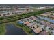 Aerial view of single-Gathering home in residential neighborhood at 13925 Miranese St, Venice, FL 34293