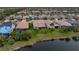 Aerial view of houses, pools, and community features at 13925 Miranese St, Venice, FL 34293