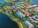 Aerial view of community amenities and lake at 13925 Miranese St, Venice, FL 34293