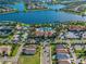 Aerial view of community pool, tennis courts, and clubhouse at 13925 Miranese St, Venice, FL 34293