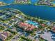 Resort-style community pool, tennis courts, and clubhouse at 13925 Miranese St, Venice, FL 34293