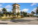 Gated community entrance with palm trees and landscaping at 13925 Miranese St, Venice, FL 34293