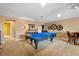 Game room with ping pong table and bathroom access at 13925 Miranese St, Venice, FL 34293