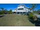 Elevated home with large deck and water views at 145 Burns Rd, Terra Ceia, FL 34250