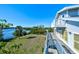 Spacious waterfront deck with scenic water views at 145 Burns Rd, Terra Ceia, FL 34250