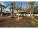 Private backyard with gazebo and mature trees at 14802 7Th E Ave, Bradenton, FL 34212