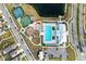 Community pool, playground, and sports courts at 15304 Miller Creek Dr, Sun City Center, FL 33573