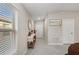 Bright and airy entryway with tile floors and a console table at 15304 Miller Creek Dr, Sun City Center, FL 33573