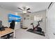 Home office or gym with desk, chair, and Peloton at 15304 Miller Creek Dr, Sun City Center, FL 33573