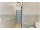 Small bathroom with grey tile and glass shower at 1625 Bravo Dr, Clearwater, FL 33764