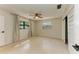 Serene bedroom featuring light walls and a ceiling fan at 1625 Bravo Dr, Clearwater, FL 33764