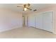 Spacious bedroom with light pink walls and built-in closet at 1625 Bravo Dr, Clearwater, FL 33764