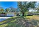 Ranch house with attached two-car garage and large yard at 1625 Bravo Dr, Clearwater, FL 33764