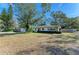 House with large front yard and mature trees at 1625 Bravo Dr, Clearwater, FL 33764