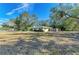 House with large front yard and mature trees at 1625 Bravo Dr, Clearwater, FL 33764