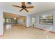 Living room with view into dining area at 1625 Bravo Dr, Clearwater, FL 33764