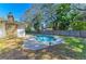 View of a kidney-shaped pool and patio area at 1625 Bravo Dr, Clearwater, FL 33764