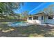 Inviting kidney-shaped pool in the backyard at 1625 Bravo Dr, Clearwater, FL 33764