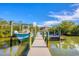 Boat dock with floating platform and seating at 1649 Manor Rd, Englewood, FL 34223