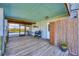 Outdoor kitchen area with grill and bamboo fence at 1649 Manor Rd, Englewood, FL 34223