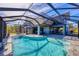 Large, screened pool and patio area at 1649 Manor Rd, Englewood, FL 34223