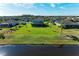 Aerial view of houses with pools and lush green lawns at 16625 5Th E Ave, Bradenton, FL 34212