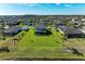 Aerial view of houses with pools and lush green lawns at 16625 5Th E Ave, Bradenton, FL 34212